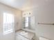 Well-lit bathroom featuring vanity, mirror, and towel rack at 4954 River Overlook Way, Lithonia, GA 30038