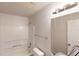 Clean bathroom featuring a shower-tub combo and modern fixtures at 4954 River Overlook Way, Lithonia, GA 30038