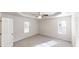 Spacious bedroom with natural light and ceiling fan at 4954 River Overlook Way, Lithonia, GA 30038