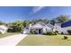 Charming single-story home featuring a well-manicured front yard, a concrete driveway, and a cozy, inviting entrance at 4954 River Overlook Way, Lithonia, GA 30038