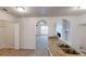 Updated kitchen with granite counters provides easy access to an open living room at 4954 River Overlook Way, Lithonia, GA 30038