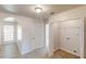 Convenient laundry room features shelving and washer-dryer hookups at 4954 River Overlook Way, Lithonia, GA 30038