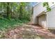 Home exterior with a wooded back yard at 5229 Kirk Dr, Atlanta, GA 30349