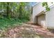 A backyard with grass and a walkway at 5229 Kirk Dr, Atlanta, GA 30349