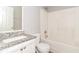 Bathroom with a shower, toilet and granite countertop sink at 5229 Kirk Dr, Atlanta, GA 30349