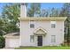 Charming two-story home featuring a classic design and a well-maintained front yard at 5229 Kirk Dr, Atlanta, GA 30349