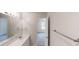 Clean and neutral bathroom featuring a double vanity and tile floor at 6614 Biscayne Blvd, Rex, GA 30273