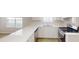 Modern kitchen featuring sleek countertops and stainless steel gas range at 6614 Biscayne Blvd, Rex, GA 30273
