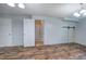 This basement boasts wood floors and a sliding barn door at 70 Ashbury Ct, Dallas, GA 30157