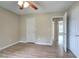 Bedroom with wood flooring, ceiling fan, and neutral paint at 70 Ashbury Ct, Dallas, GA 30157