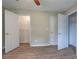 Bedroom with multiple closets and light wood flooring at 70 Ashbury Ct, Dallas, GA 30157