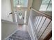 Entryway with staircase and front door with accent window above at 70 Ashbury Ct, Dallas, GA 30157
