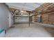 Large garage space with exposed beams, ready for customization at 70 Ashbury Ct, Dallas, GA 30157