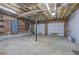 Large garage space with exposed beams, ready for customization at 70 Ashbury Ct, Dallas, GA 30157