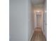 Hallway with neutral paint and wood flooring at 70 Ashbury Ct, Dallas, GA 30157