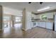 Kitchen with white cabinets and stainless-steel appliances with wood flooring at 70 Ashbury Ct, Dallas, GA 30157
