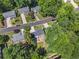 Aerial view of neighborhood homes featuring mature trees, well-manicured lawns, and inviting landscapes at 1175 Haven Brook Ne Way, Brookhaven, GA 30319