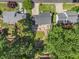 Aerial view showcasing neighborhood homes with manicured lawns, spacious decks, and mature trees at 1175 Haven Brook Ne Way, Brookhaven, GA 30319