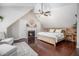 Inviting main bedroom featuring a fireplace, ceiling fan, and hardwood floors at 1175 Haven Brook Ne Way, Brookhaven, GA 30319