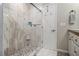 Modern shower with neutral tile, built-in niche, and stylish fixtures at 1175 Haven Brook Ne Way, Brookhaven, GA 30319