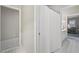 Bright bathroom showcases a white tiled floor and white shower curtain at 1243 Williamswood Pointe, Decatur, GA 30033