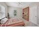 Bright bedroom with ceiling fan, large built-in bookshelf and natural light at 1243 Williamswood Pointe, Decatur, GA 30033