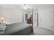 Bright bedroom with carpeted floor, ceiling fan and multiple doors and windows at 1243 Williamswood Pointe, Decatur, GA 30033