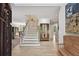 Bright foyer with hardwood floors, staircase, and natural light at 1243 Williamswood Pointe, Decatur, GA 30033