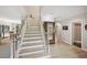 Foyer with hardwood floors, staircase and view to dining room at 1243 Williamswood Pointe, Decatur, GA 30033