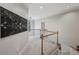 Hallway featuring carpet flooring, neutral walls and wood railing at 1243 Williamswood Pointe, Decatur, GA 30033