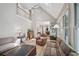 Large living area with an abundance of natural light and hardwood floors at 1243 Williamswood Pointe, Decatur, GA 30033