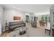 Cozy living room with neutral walls, hardwood floors, fireplace, and comfortable seating at 1243 Williamswood Pointe, Decatur, GA 30033