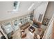 Overhead view of a well-lit living room with large windows and hardwood floors at 1243 Williamswood Pointe, Decatur, GA 30033