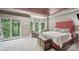Spacious main bedroom with floor to ceiling windows overlooking a serene view at 1243 Williamswood Pointe, Decatur, GA 30033