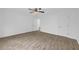 This simple bedroom is bright and features a ceiling fan and wood-look floors at 203 Bridge Se Ln, Smyrna, GA 30082