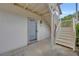 Exterior staircase leading to front door of condo unit with door number 203 at 203 Bridge Se Ln, Smyrna, GA 30082