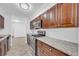 Updated kitchen featuring stainless appliances, granite counters, and wood-look flooring at 203 Bridge Se Ln, Smyrna, GA 30082