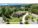 Bird's eye view of gorgeous home highlighting landscaping, circular drive, and traditional exterior at 341 Carl Sanders Dr, Acworth, GA 30101