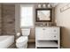 Cozy bathroom with a vanity, framed mirror, and tub/shower combo at 341 Carl Sanders Dr, Acworth, GA 30101