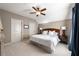 Comfortable bedroom with a ceiling fan, neutral colors, and plenty of natural light at 341 Carl Sanders Dr, Acworth, GA 30101