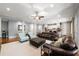 Inviting living room open to kitchen, featuring comfortable seating and stylish decor at 341 Carl Sanders Dr, Acworth, GA 30101