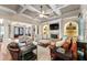 Spacious living room with coffered ceilings, fireplace, and comfortable seating arrangement perfect for gatherings at 341 Carl Sanders Dr, Acworth, GA 30101
