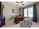 Bright office space with large windows, a ceiling fan, and comfortable seating for guests at 341 Carl Sanders Dr, Acworth, GA 30101