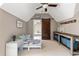 Charming playroom featuring a barn door, built-in storage, and a whimsical atmosphere at 341 Carl Sanders Dr, Acworth, GA 30101
