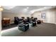 Home theater featuring plush seating and a tiered floor for optimal viewing at 341 Carl Sanders Dr, Acworth, GA 30101