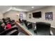 Home theater boasting comfortable seating, large screen, and decorative wall art at 341 Carl Sanders Dr, Acworth, GA 30101