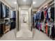 Spacious walk-in closet with custom shelving and ample storage for clothing and accessories at 341 Carl Sanders Dr, Acworth, GA 30101