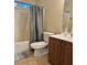 Bathroom featuring a shower, toilet, and vanity with tiled floors at 737 Cooper Sw St, Atlanta, GA 30315