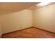 Basement area featuring carpet and painted walls, illuminated by ceiling lighting at 1341 Timbercrest Ct, Lawrenceville, GA 30045