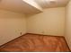 This finished basement room features neutral walls and neutral carpet at 1341 Timbercrest Ct, Lawrenceville, GA 30045